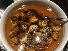 古越陈酿煮花螺-杭州西子湖四季酒店·金沙厅