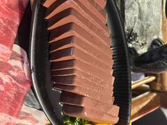-老牌坊云南鱼豆花火锅(哈西万达店)