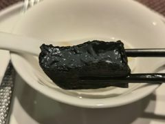 猴头菇鲍汁瑶柱扒制黑豆腐-肴约·花园式餐厅(湖里店)