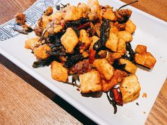 普洱茶炒包浆豆腐-云海肴·汽锅鸡·云南菜(天山百盛优客店)