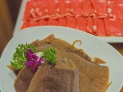 -明何记涮牛肚(品牌首店隋唐植物园南门古城路店)