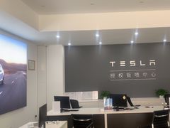 -北亚国超特斯拉授权钣喷中心