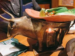 包烧野生牛肝菌-云海肴·汽锅鸡·云南菜(天山百盛优客店)