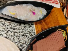 -老牌坊云南鱼豆花火锅(哈西万达店)
