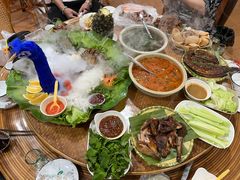 -沐毫傣泐云南菜孔雀宴•手抓饭傣味烧烤(曼听公园店)
