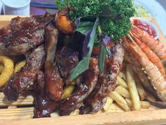 炭烤猪肋排配烤鸡翅及土豆串红-花园饭店-西餐厅