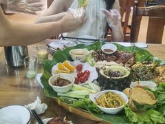 -沐毫傣泐云南菜孔雀宴•手抓饭傣味烧烤(曼听公园店)