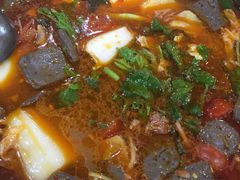 -黄利砖万峰林布依特色酸笋牛肉馆