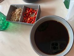 -喃喃椰·糟粕醋·椰子鸡火锅(七堡花园店)