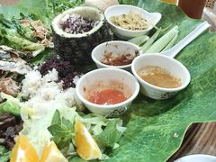 -沐毫傣泐云南菜孔雀宴•手抓饭傣味烧烤(曼听公园店)