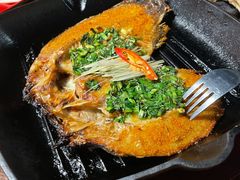 傣族香茅草烤罗非鱼-雀舞云南菜(天津天河城购物中心店)