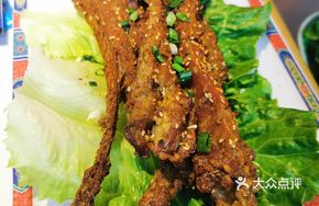 Signature Charcoal-Grilled Lamb Ribs