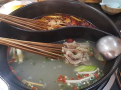 -明何记涮牛肚(品牌首店隋唐植物园南门古城路店)