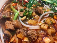 -爆炸头阿姨小四川正宗川味小吃(无任何分店)