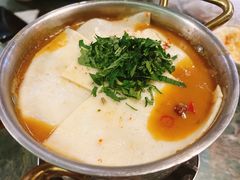 牛牛霸鸡脚煲-浩海火烧云傣家菜(京广店)