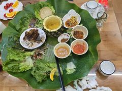 -沐毫傣泐云南菜孔雀宴•手抓饭傣味烧烤(曼听公园店)