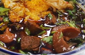Soup Dumplings with Beef, Intestines and Egg