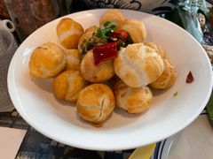 酸菜炒汤圆-蜗牛小馆醉乡民谣云南菜(惠新西里店)