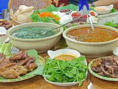 -沐毫傣泐云南菜孔雀宴•手抓饭傣味烧烤(曼听公园店)