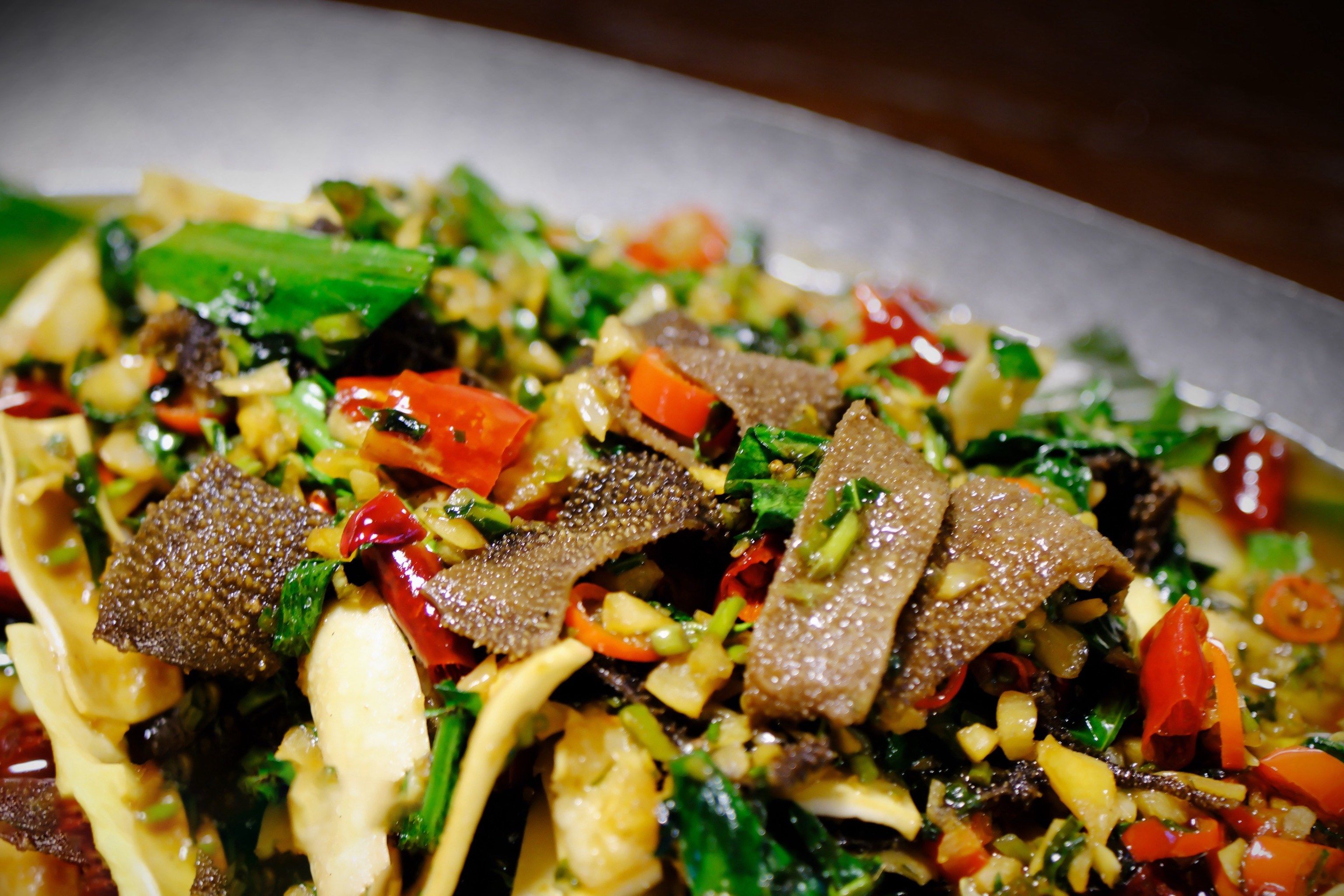 🌟傣味风情,油呛黄喉毛肚的香辣诱惑🌟