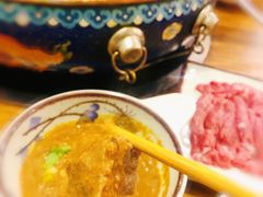 -毛辣果·贵州红酸汤牛肉火锅(西单店)