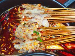 -明何记涮牛肚(品牌首店隋唐植物园南门古城路店)