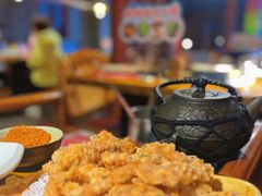 -老牌坊云南鱼豆花火锅(哈西万达店)