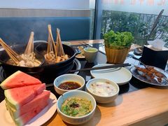 -明何记涮牛肚(品牌首店隋唐植物园南门古城路店)