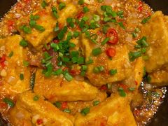 普洱茶炒包浆豆腐-云海肴·汽锅鸡·云南代表菜(天山百盛优客店)