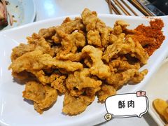 -明何记涮牛肚(品牌首店隋唐植物园南门古城路店)