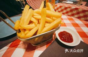 Chicken Makhani with Fries and Rice