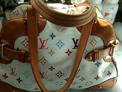 -京伟修鞋洗鞋奢侈品皮具护理店