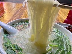 -梁老三麻辣鸡头总店