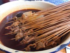 -拈签一笑黄牛肉辣卤串串