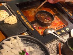 -老牌坊云南鱼豆花火锅(哈西万达店)
