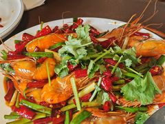 -曼听小寨海鲜烧烤·大连辣炒大王(盖州街店)