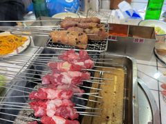 -喜悦小串丹东小黄牛海鲜烧烤大排档(民主广场店)