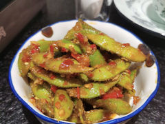 绝味毛豆-何妹湿辣牛肉·粤式烧烤砂煲(桂雅路店)