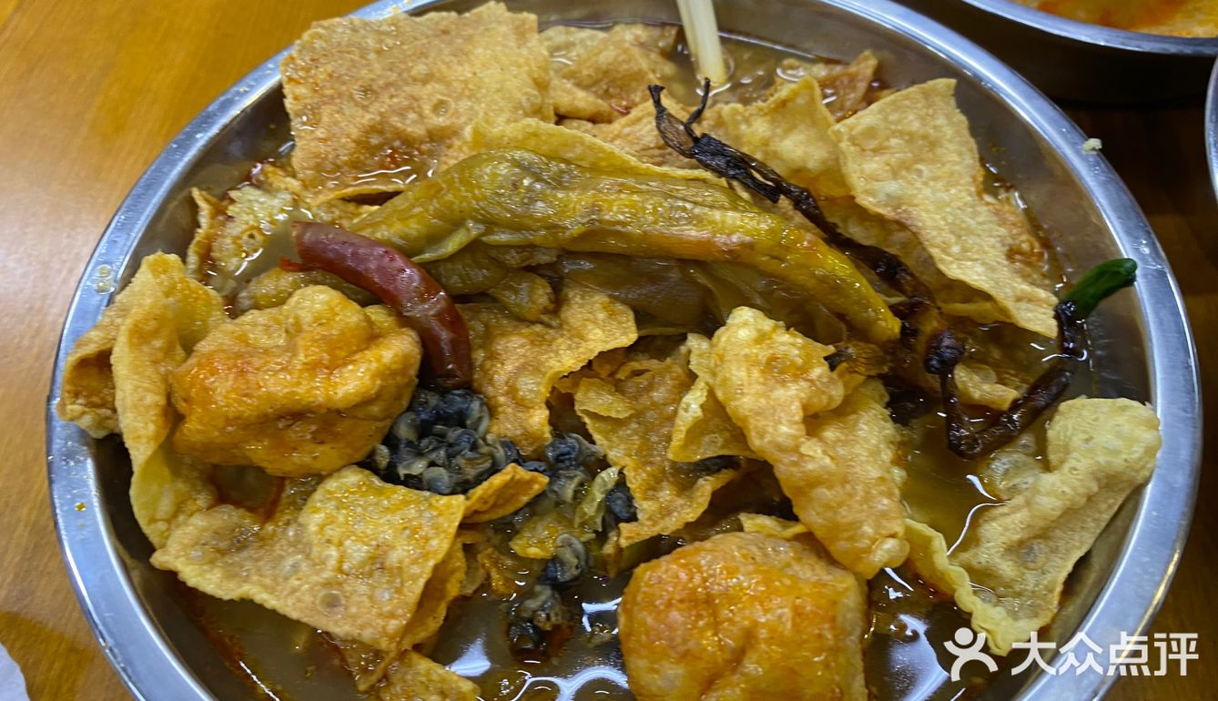 再搭配他们家的豆花或者豆奶,酣畅淋漓!
