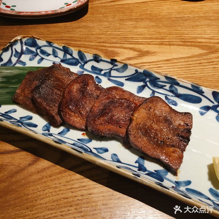 九本しんいち居酒屋(学院路店)黄油煎牛舌图片