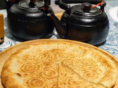 馕坑芝麻馕-巴扎美食·新疆菜·西域歌舞表演餐厅(新疆大厦店)