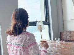 橘子气泡拿铁-云之上咖啡馆