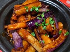 茄子烧年糕-恭喜上堓砂锅焗·海鲜大排档(闵行龙湖店)