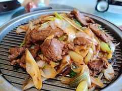 经典葱爆小羔羊肉-悦融·京鲁菜·露台花园(安定门店)