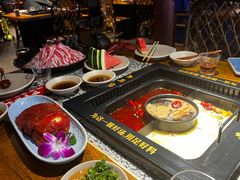 -老牌坊云南鱼豆花火锅(哈西万达店)