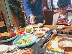 -老牌坊云南鱼豆花火锅(哈西万达店)