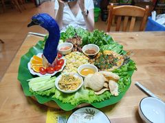 -沐毫傣泐云南菜孔雀宴•手抓饭傣味烧烤(曼听公园店)