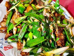 盐煎肉-洪平血旺椒麻鸡雅鱼饭店(熊猫大道店)