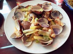 葱姜炒蛤蜊-小铜锣湾海鲜家常菜馆(河西店)