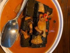 猴头菇鲍汁瑶柱扒制黑豆腐-肴约·花园式餐厅(湖里店)